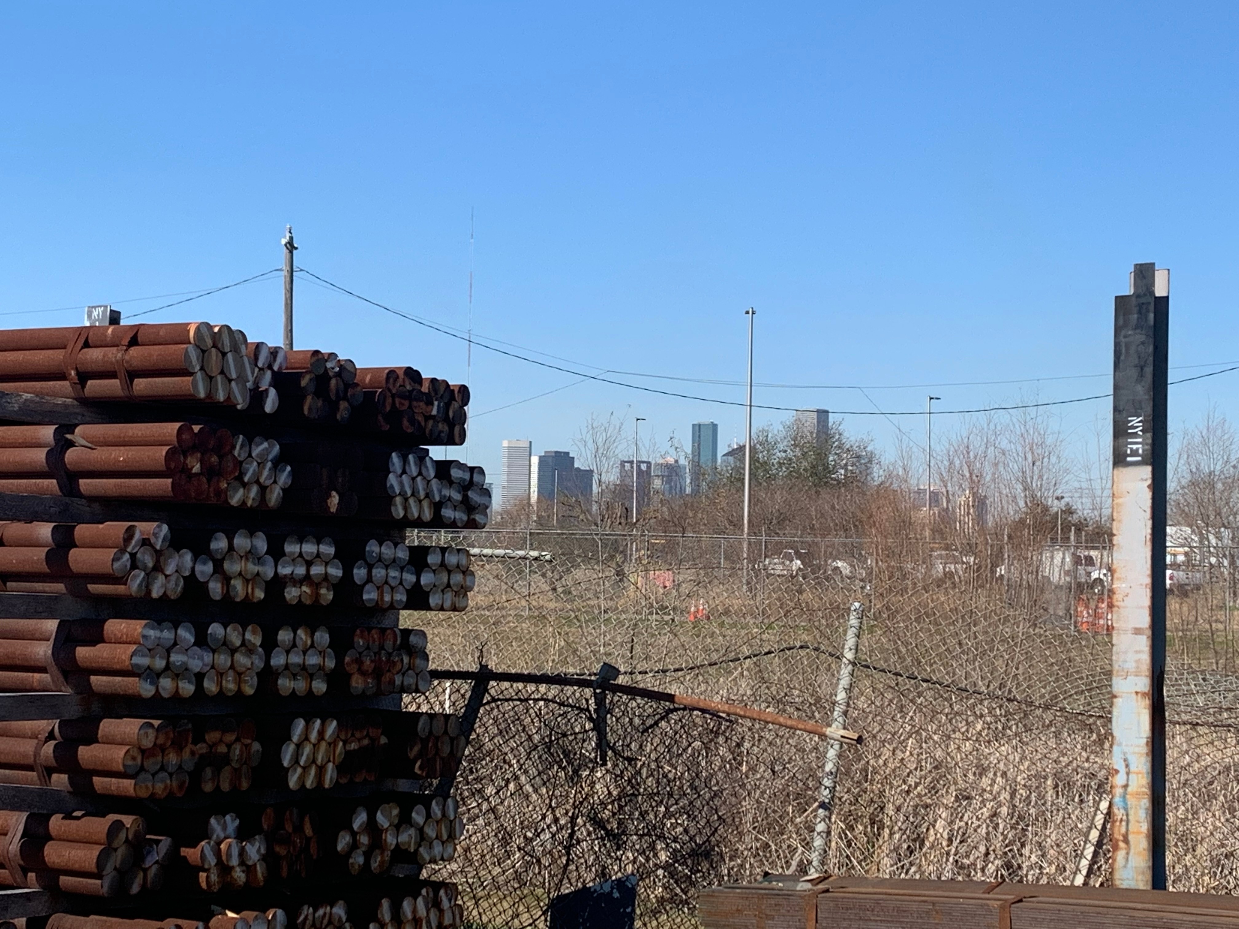Steel yard with Houston skyline in the background
